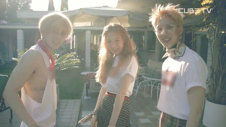 Triple H (group with Hyuna, Edwan, and Hui) standing outside